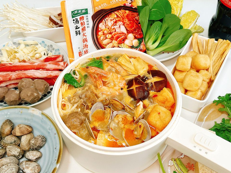 糟粕醋海鲜小火锅，体验地道海南酸辣风味